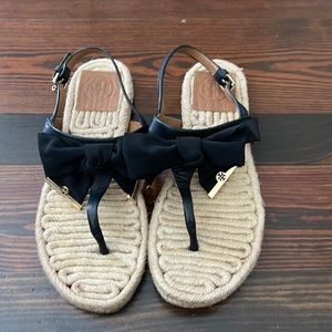 Tory Burch sandals with black bow. Size 6.5. Fits like a 7 I think. Gently worn